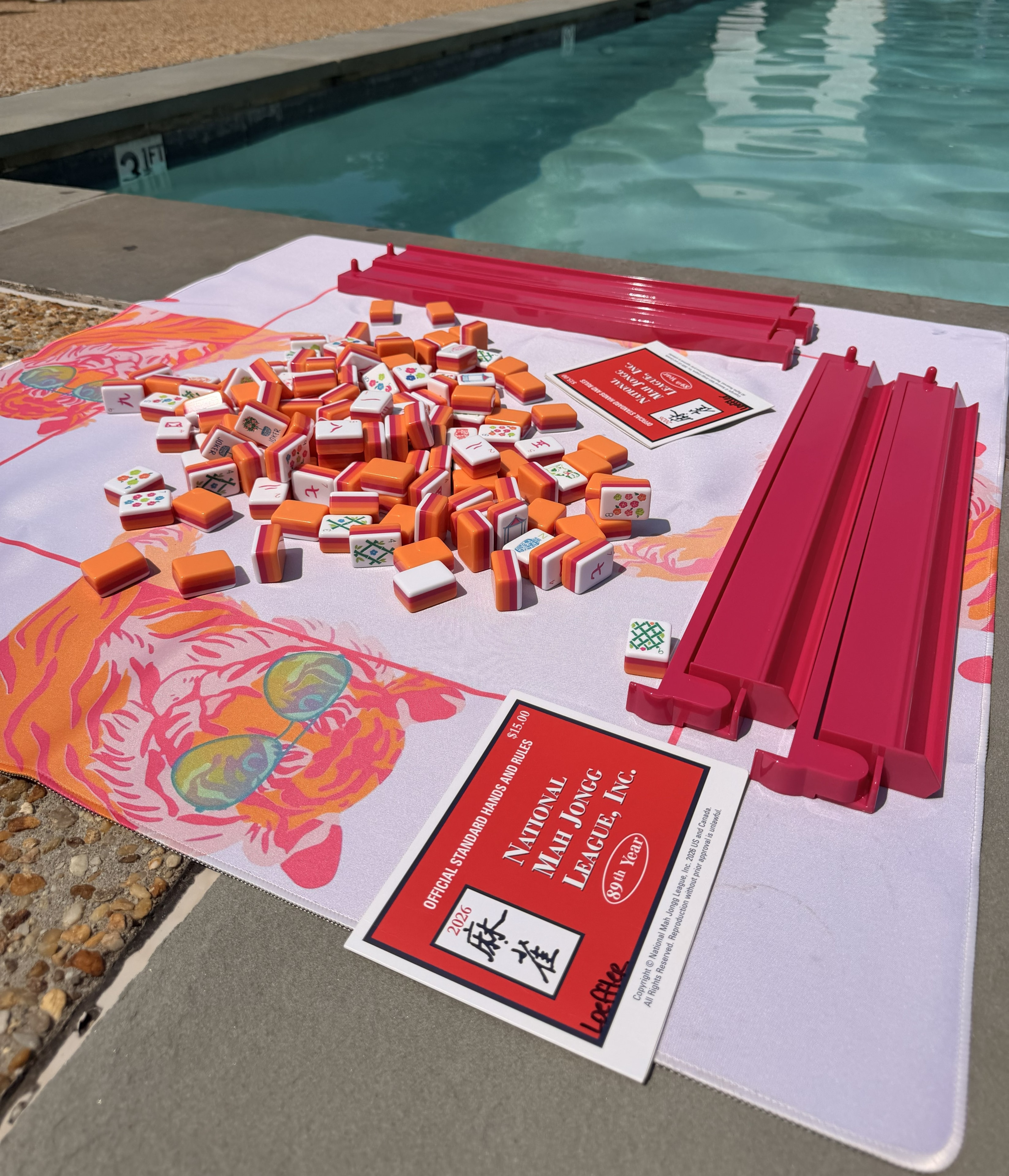 Orange tile set with hot pink racks and tiger mat poolside